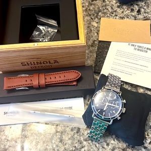 Shinola Blue faced chronograph watch with two straps and removed links.